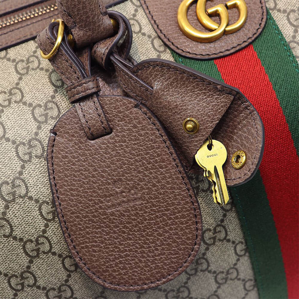G*u*i savoy medium duffle bag